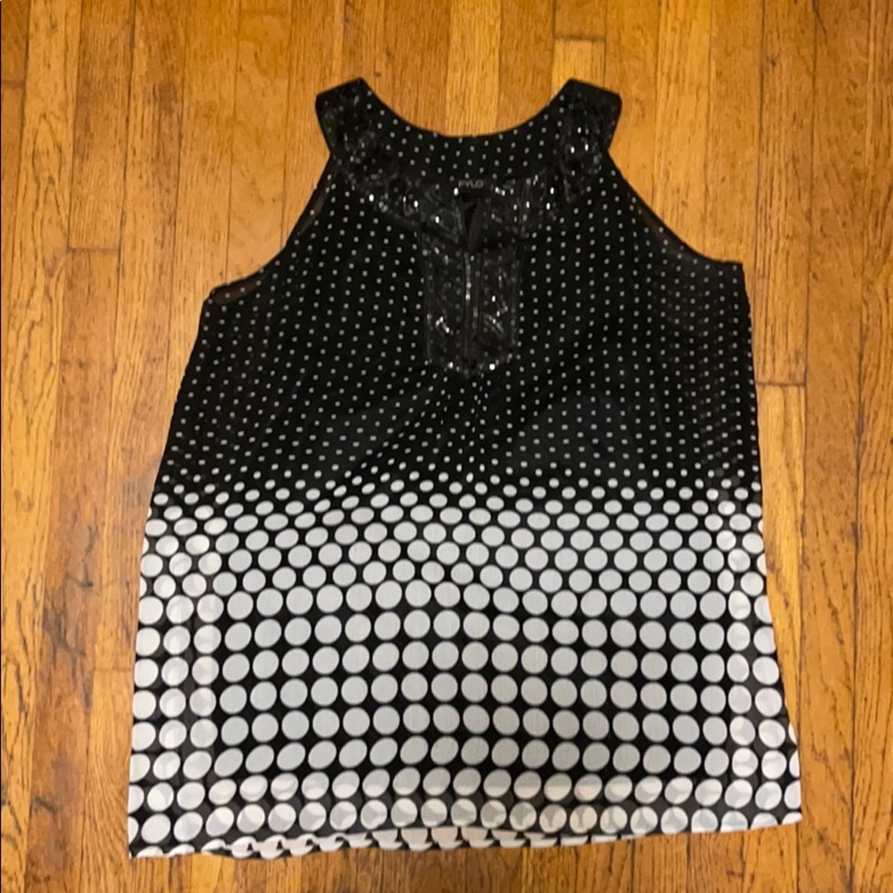 Long sleeveless blouse
